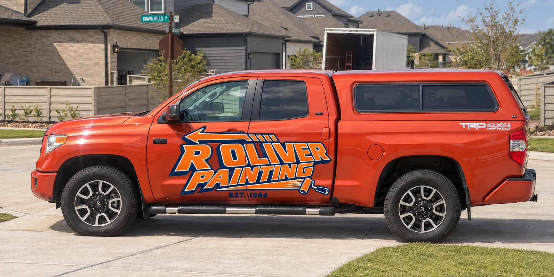 R Oliver Painting orange truck